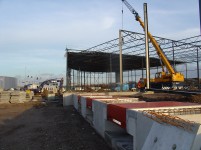 De komende jaren zal de logistieke sector het aantal opdrachten voor de bouw van nieuwe opslagfaciliteiten halveren.