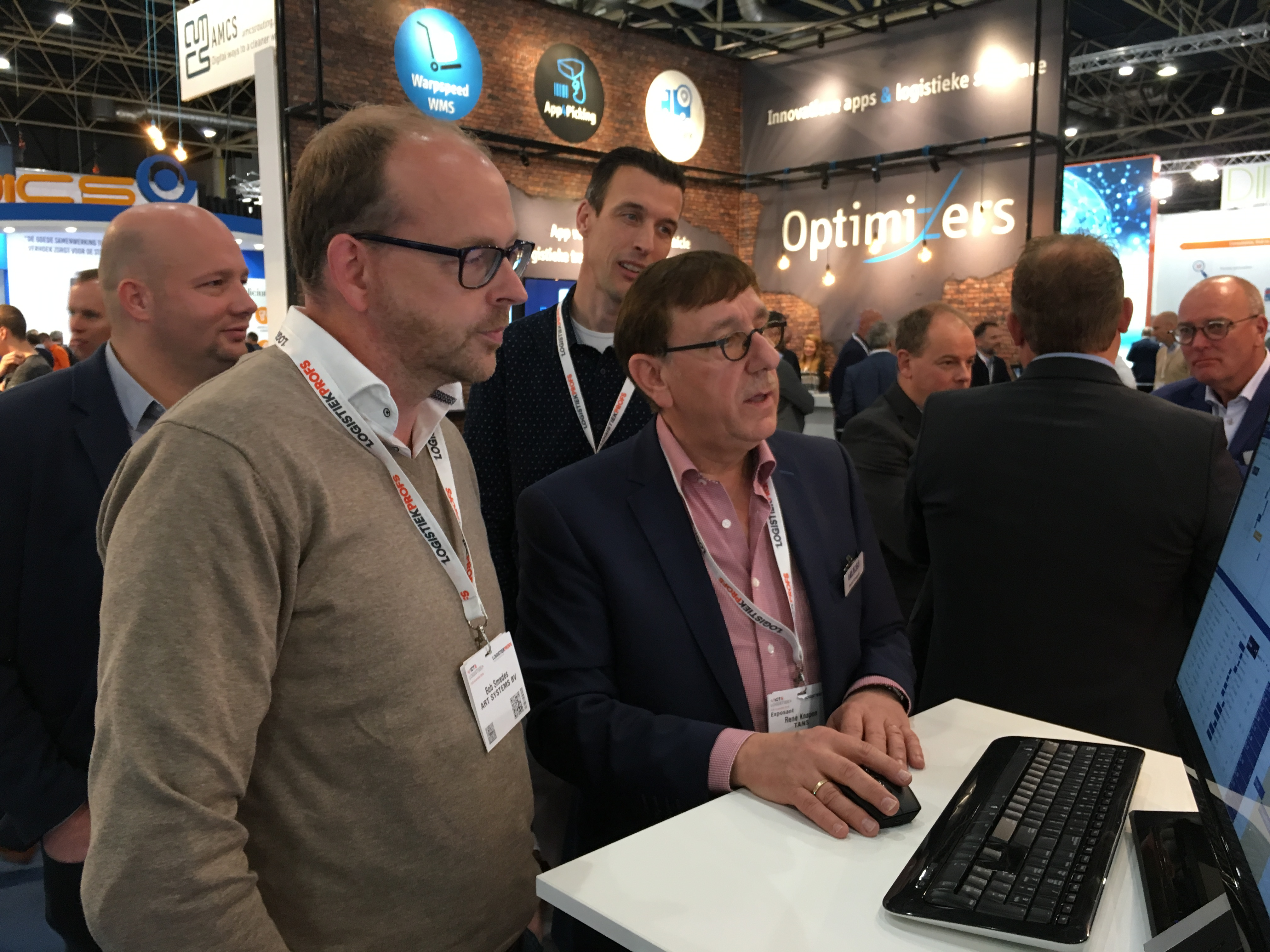 TANS-directeur René Knapen (foto midden) presenteert tijdens deze ICT&Logistiek de nieuwe planningstool Impact.